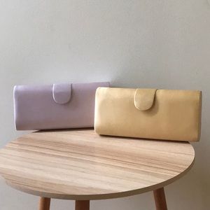 Purple & yellow clutches